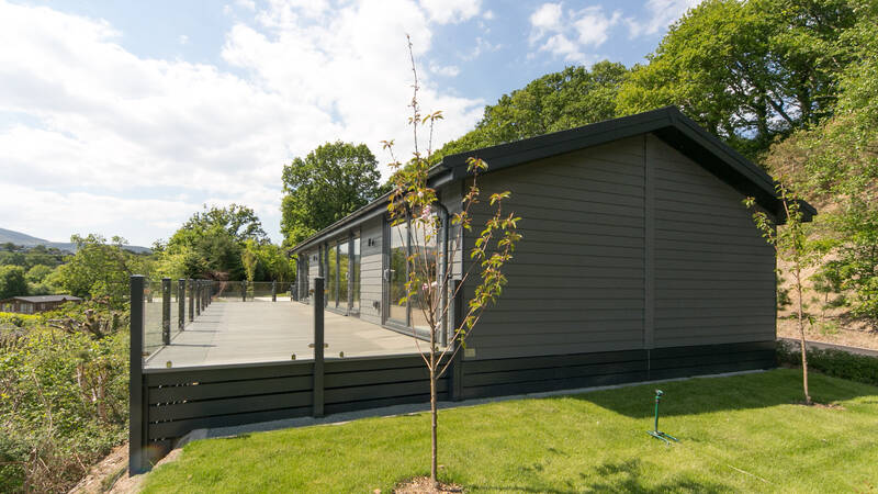 2025 Estuary View 21 rear side of lodge